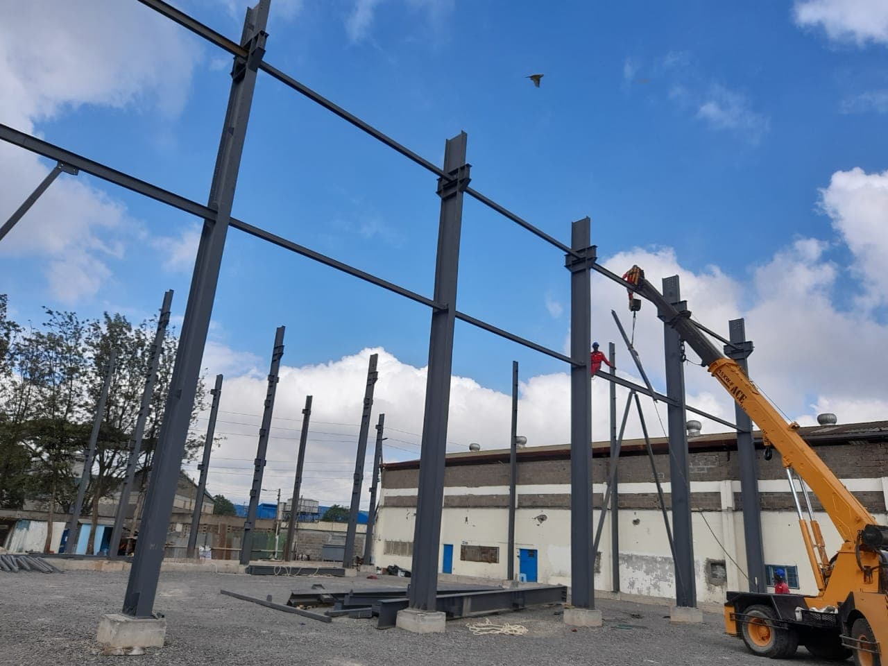 Structural steel erection with lifting equipment on a Dunhill construction site